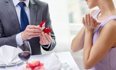 Man Proposes And Considers Prenuptial Agreement With Help Of Family Lawyer