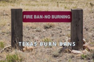 Warning sign during a Texas burn ban amid dry conditions and wildfire risk.