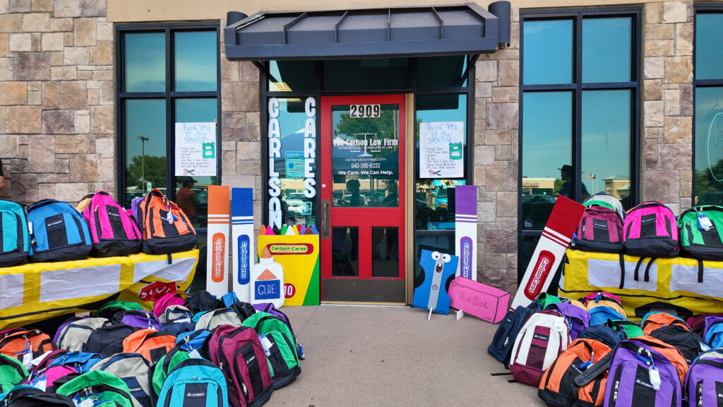Carlson Cares welcomed more than 400 community members while distributing 250 backpacks to Wichita Falls students before the new school year.