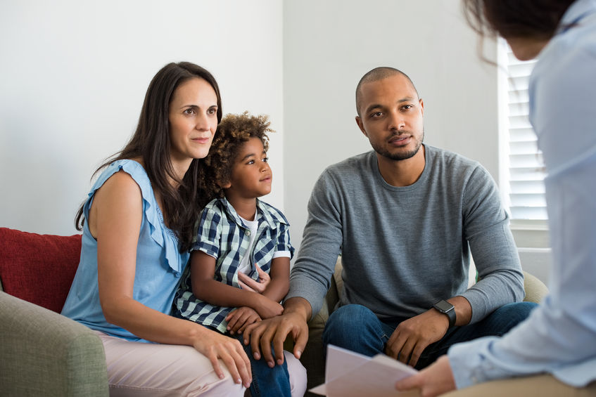 divorced couple in mediation with their child