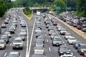 Heavy holiday traffic traveling along a highway during Labor Day weekend.