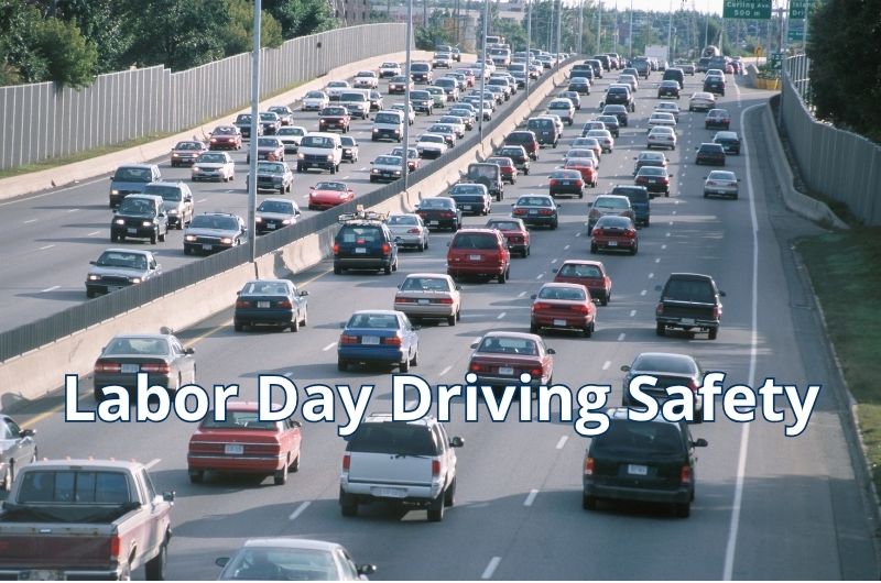 Heavy holiday traffic traveling along a highway during Labor Day weekend.