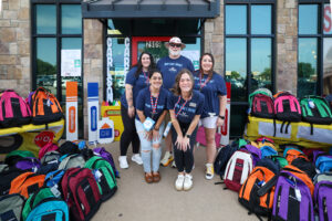 Carlson Cares welcomed more than 400 community members while distributing 250 backpacks to Wichita Falls students before the new school year.