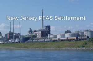Industrial facility near a waterway related to PFAS contamination concerns in New Jersey.