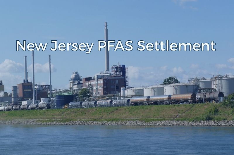 Industrial facility near a waterway related to PFAS contamination concerns in New Jersey.
