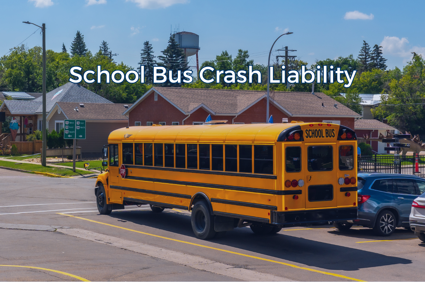 School bus traveling through traffic on a roadway.