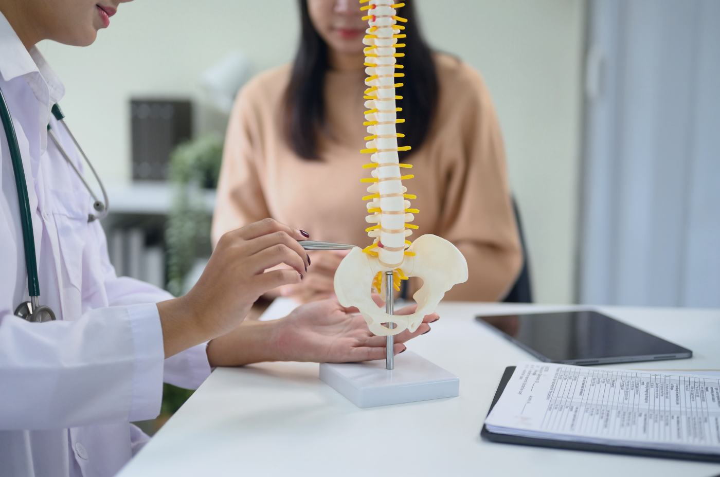 A doctor-patient spine consultation for a spinal cord stimulator