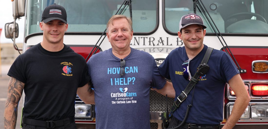 058A3111-scaled Image of Craig Carlson with two Bell County firefighters