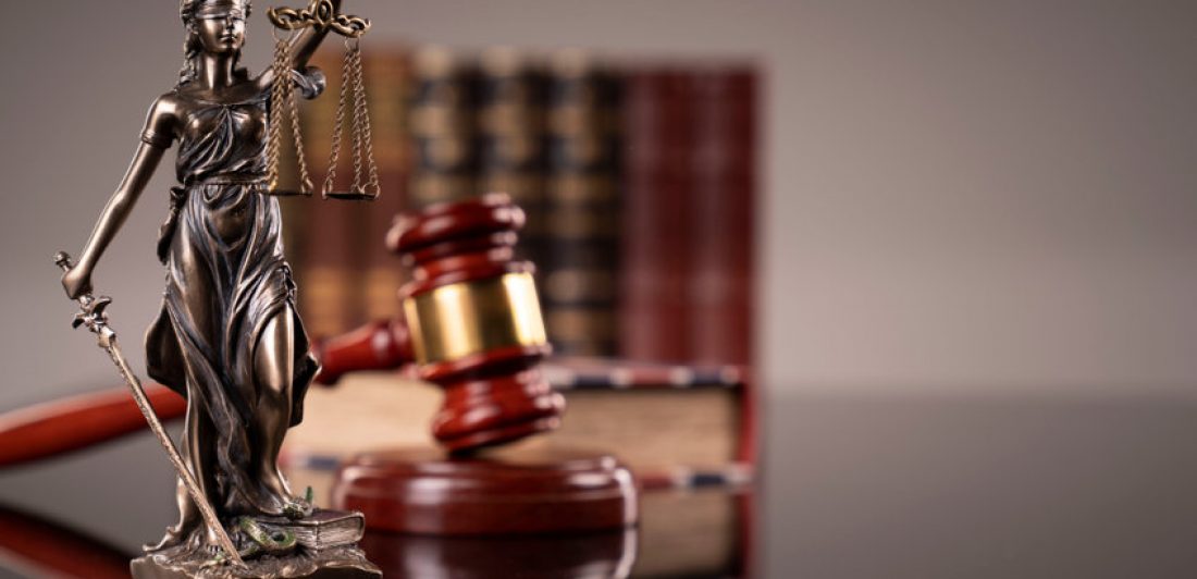 Statue of justice – Themis, legal codes and  gavel of the judge. Image of lady justice with gavel and books