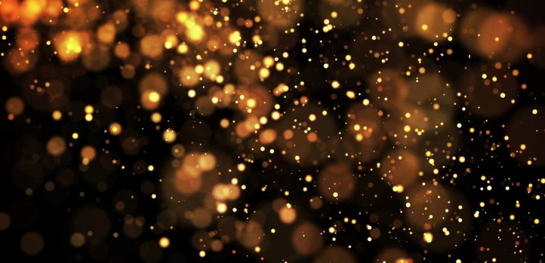 composition of gold particles with a depth of field 3d render Image of sparks