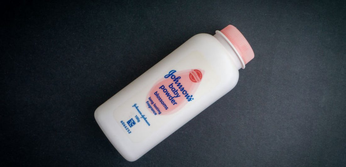 Bottle of Johnson & Johnson baby powder on black background Image of Johnson's baby powder container
