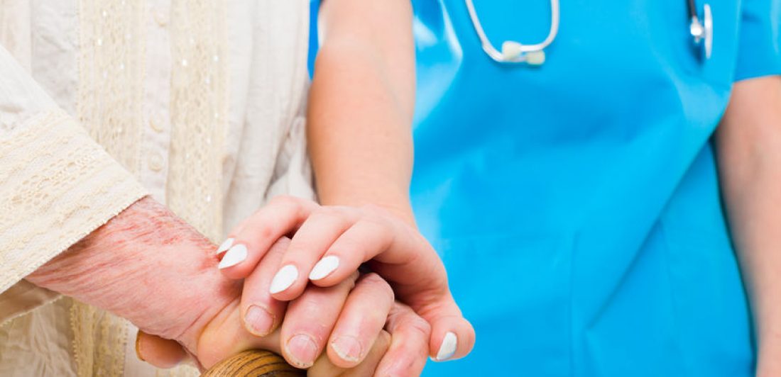 Rely on me Image of healthcare worker comforting an elderly person holding a cane