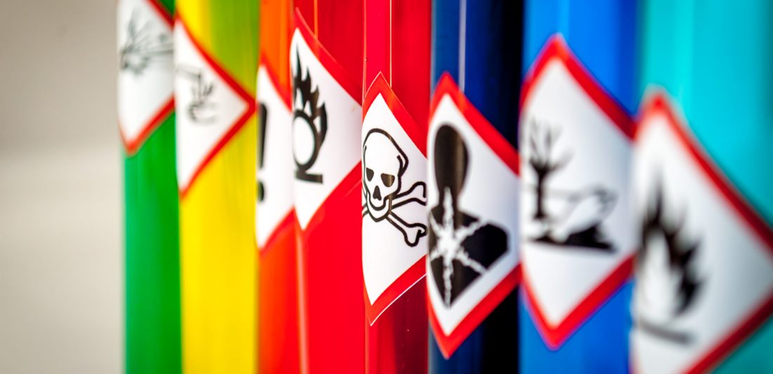 Chemical hazard pictograms Toxic focus Image of colorful bottles of hazardous materials