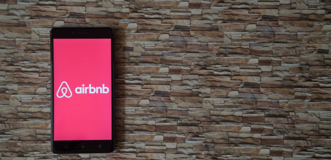 88739747_l-scaled Image of cell phone with airbnb graphic displayed