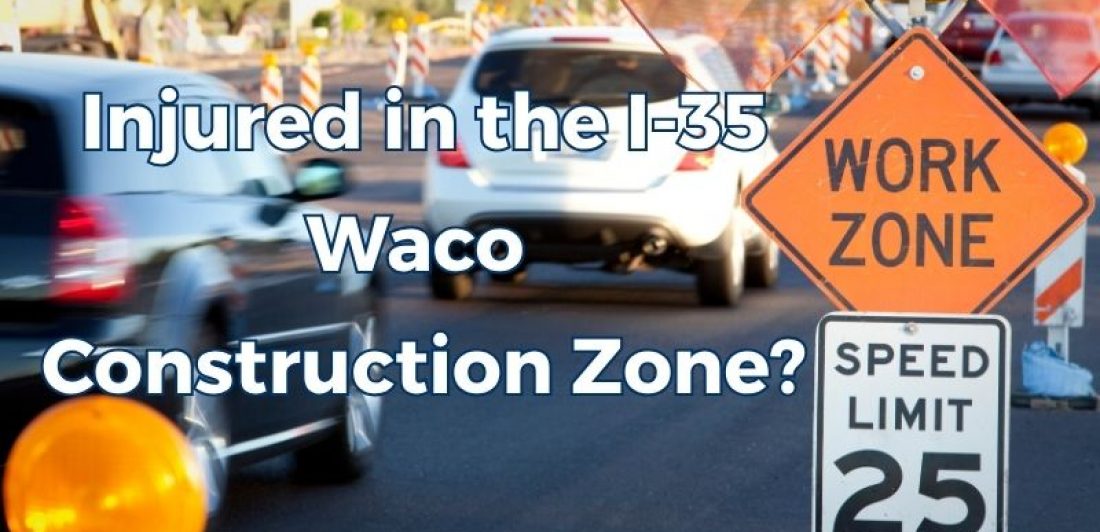 Traffic traveling through an Interstate 35 construction zone in Waco, Texas, with a work zone sign in the foreground.