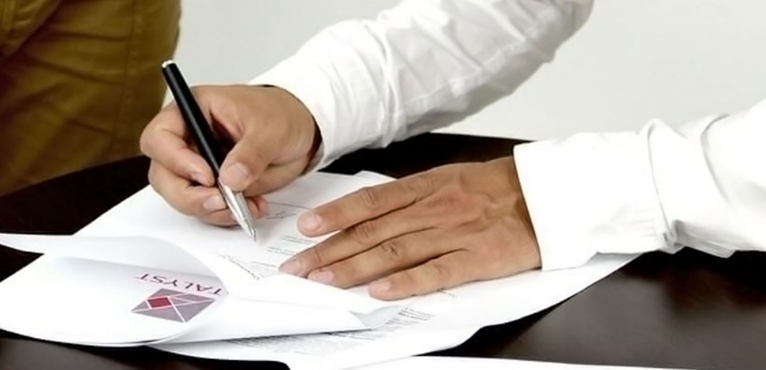 post-contingency-fees Image of a person signing paperwork