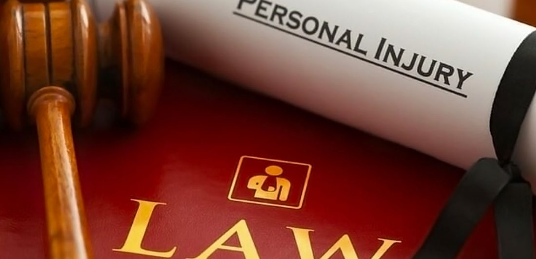 post-four-elements-of-negligence Image with gavel, law book, and personal injury paperwork