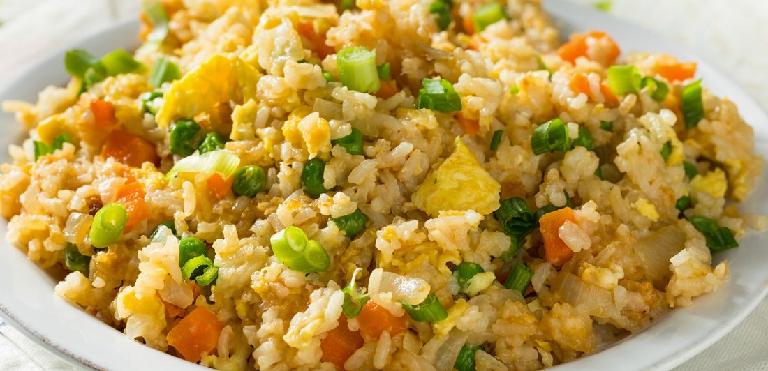 post-fried-rice-syndrome Image of fried rice on a white plate