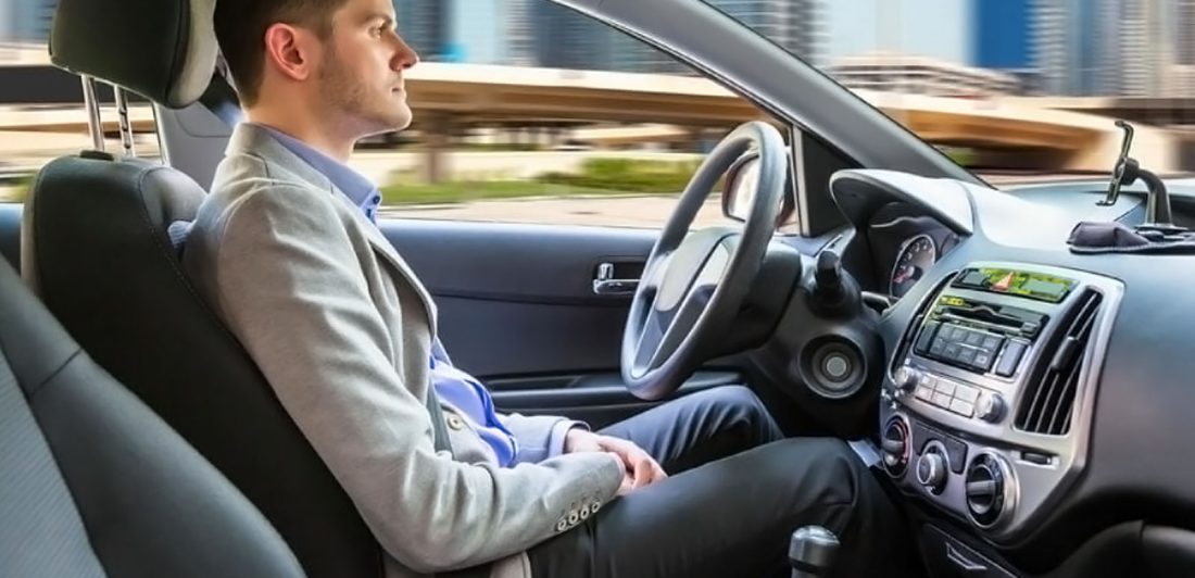 post-how-safe-is-driverless-car Image of man sitting in a self driving vehicle