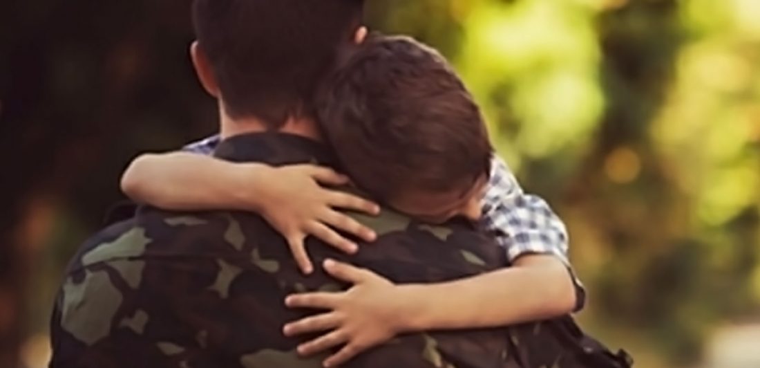 post-military-divorce Image of child hugging man in military uniform