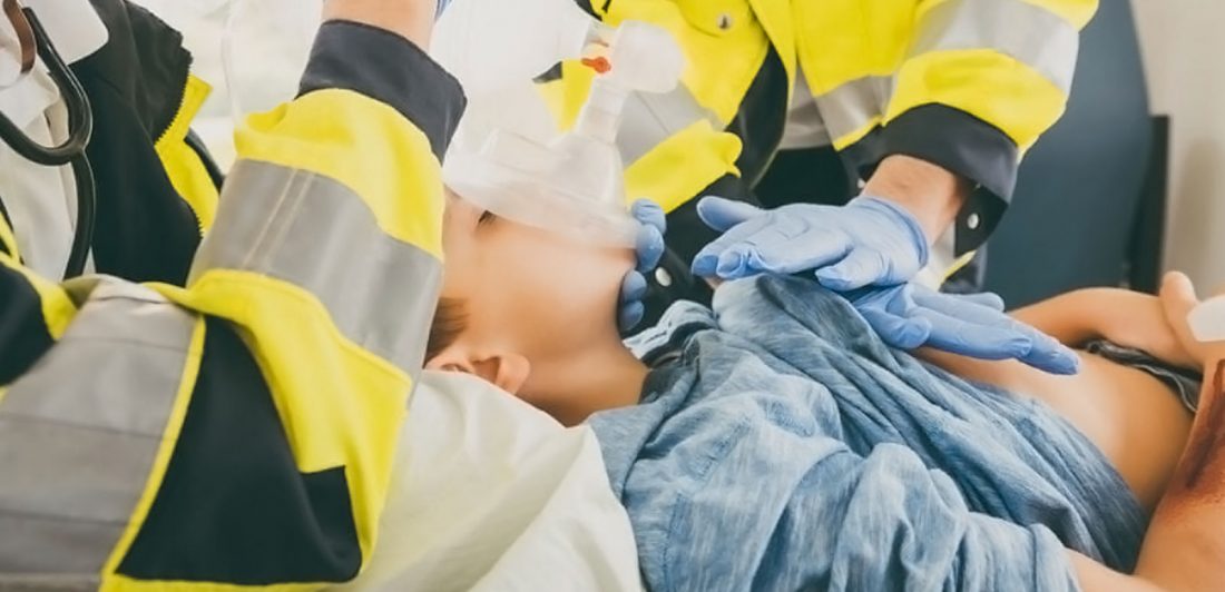 post-seat-back-failure Image of paramedics performing CPR on child