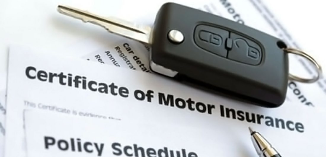 post-um-uim-faqs Image with motor insurance documents and car key