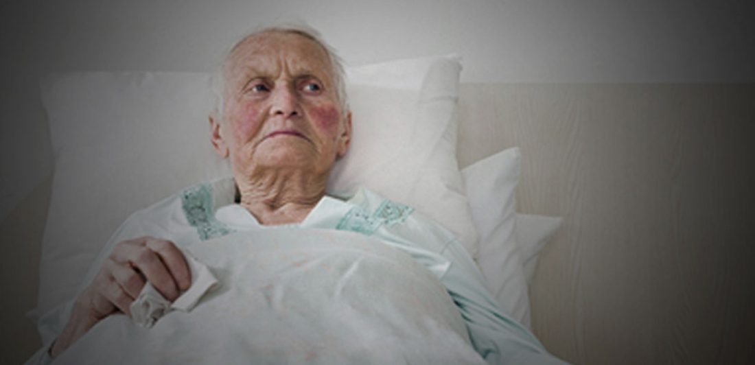 practice-area-nursing-home-injury-attorney-carlson-law-firm Image of elderly person in bed