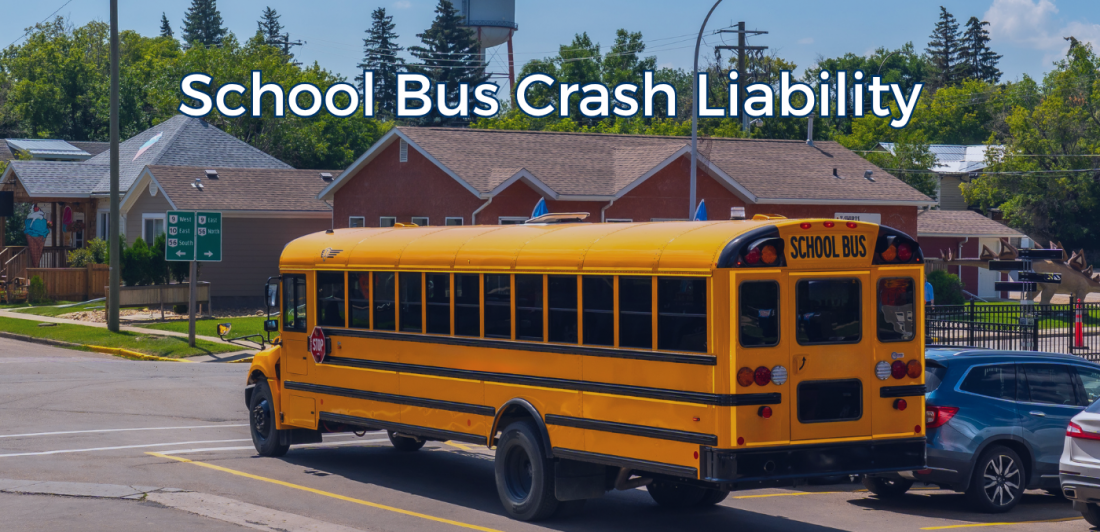 School bus traveling through traffic on a roadway.