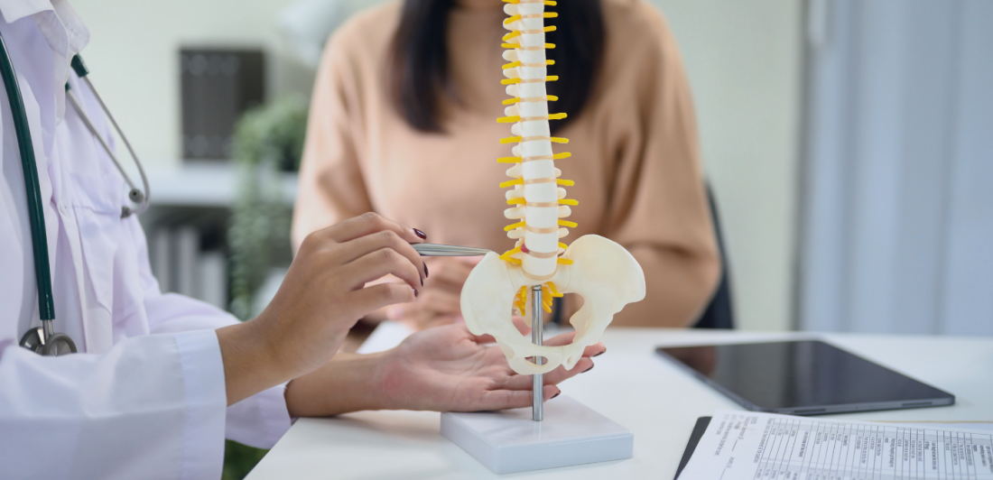 A doctor-patient spine consultation for a spinal cord stimulator