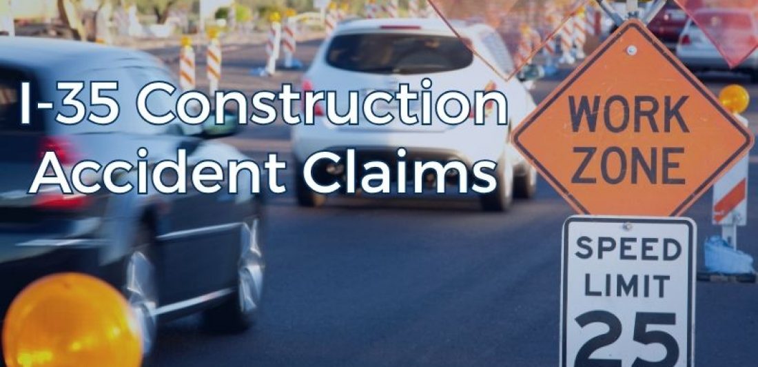 Cars and commercial trucks navigating changing lanes and construction barriers along Interstate 35 in Waco, Texas.