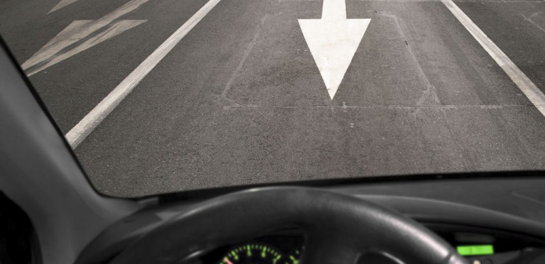 wrong way Image of a car driving the wrong way on a road